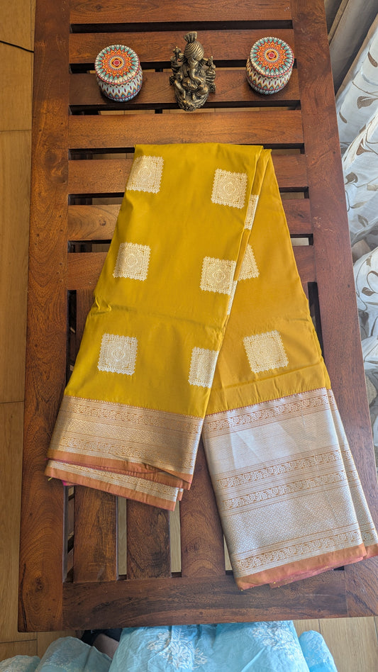 Mustard Silver Jari Semi Kanchi Silk Saree